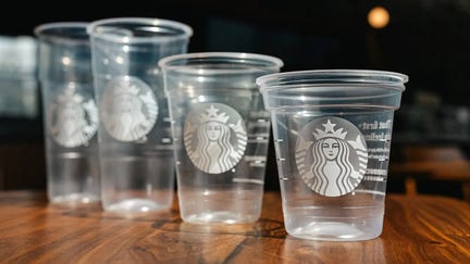 The new drink cups from Starbucks are made with up to 20 percent less plastic.