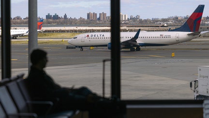 Delta planes at Terminal C of LaGuardia Airport (LGA) in the Queens borough of New York, US, on Sunday, April 7, 2024. Delta Air Lines Inc. is expected to release earnings figures on April 10. Photographer: Angus Mordant/Bloomberg via Getty Images
