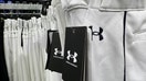 PETALUMA, CALIFORNIA - MAY 16: Under Armour apparel is displayed at a Dick&apos;s Sporting Goods store on May 16, 2024 in Petaluma, California. Under Armour reported fourth quarter earnings with revenue of $1.33 billion compared to $1.4 billion one year ago. The company also announced plans to layoff workers as North American sales fell 10 percent and don&apos;t forecast an improvement in the current fiscal year. (Photo by Justin Sullivan/Getty Images)