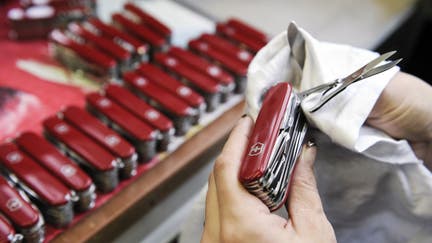 Penknives are assembled at the Victorinox AG Swiss army knife factory in Ibach, Switzerland, on Thursday, Jan. 20, 2011. Victorinox, founded in 1884 in the central Swiss town of Ibach, is the sole provider of the knives after buying rival Wenger SA in 2005. 