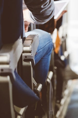 Passenger forced him to urinate in bottle, he claims