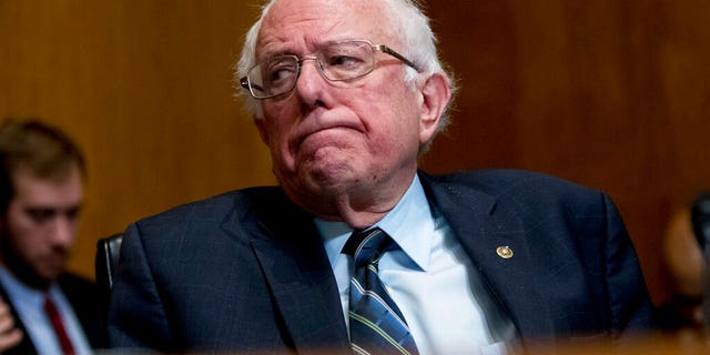 FILE - In this Jan. 16, 2019, photo, Sen. Bernie Sanders, I-Vt., reacts during a hearing on Capitol Hill in Washington. “Medicare-for-all” makes a good first impression, but support plunges when people are asked if they’d pay higher taxes or put up with treatment delays to get it. AP