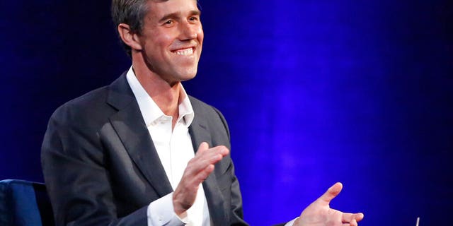 Beto O'Rourke laughing during an Oprah Winfrey in New York last February. (AP Photo/Kathy Willens, File)
