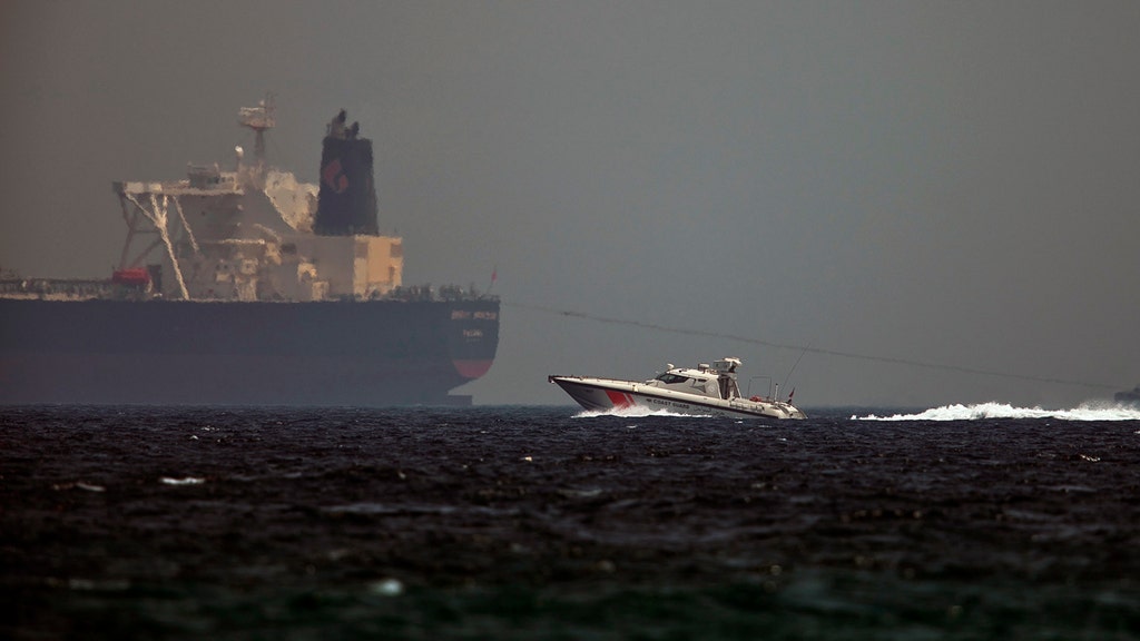 First assessment blames Iran for Middle East ship explosions, official says