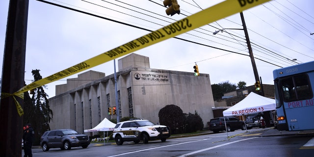 Police tape is viewed around the area on October 28, 2018 outside the Tree of Life Synagogue after a shooting there left 11 people dead in the Squirrel Hill neighborhood of Pittsburgh on October 27, 2018.