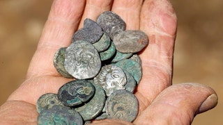 Massive Iron Age coin hoard worth millions sets Guinness World Record