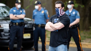 Jersey gym owners squaring off with Murphy kick down barricades