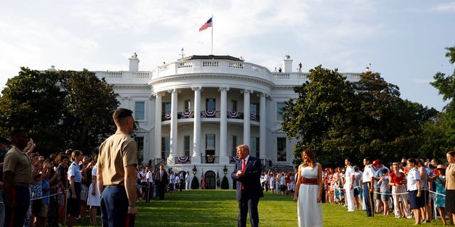 President Donald Trump and first lady Melania Trump appear at a "Salute to America" event on the South Lawn of the White House, Saturday, July 4, 2020, in Washington. (AP Photo/Patrick Semansky)