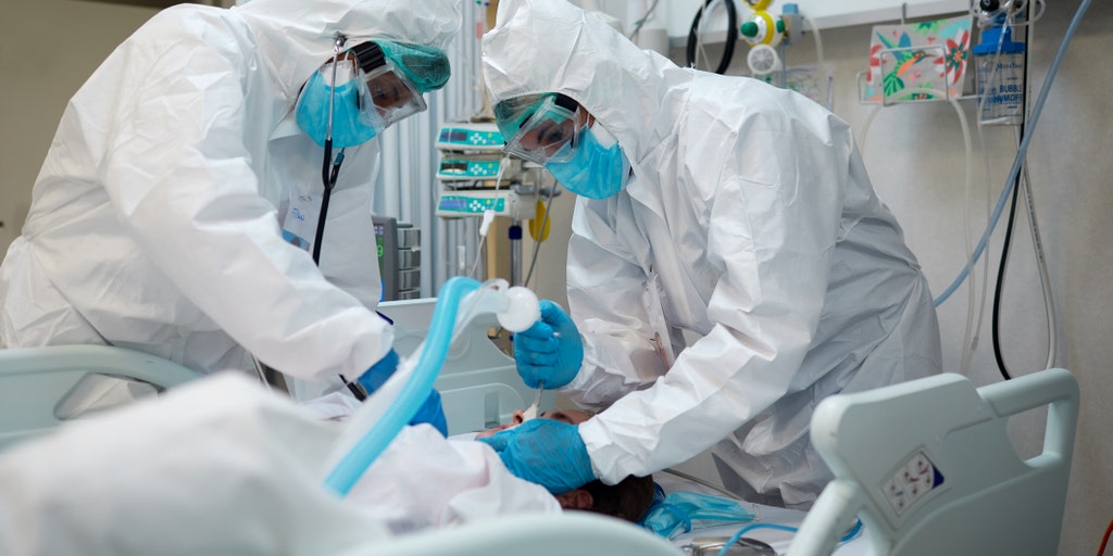 Coronavirus live updates: COVID-19 hospitalizations in US
hit record high