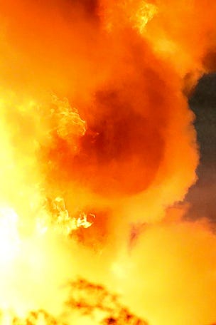 Racer survives huge BLAZE