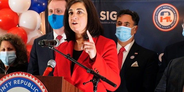 FILE: Assemblywoman Nicole Malliotakis, a candidate for the U.S. House of Representatives, speaks at the Staten Island Republican Party headquarters in the New Dorp neighborhood of Staten Island, Tuesday, Nov. 3, 2020, in New York. "I need to thank President Trump for his strong support and endorsement," Malliotakis said to cheers in the room. (Alexandra Salmieri/Staten Island Advance via AP)