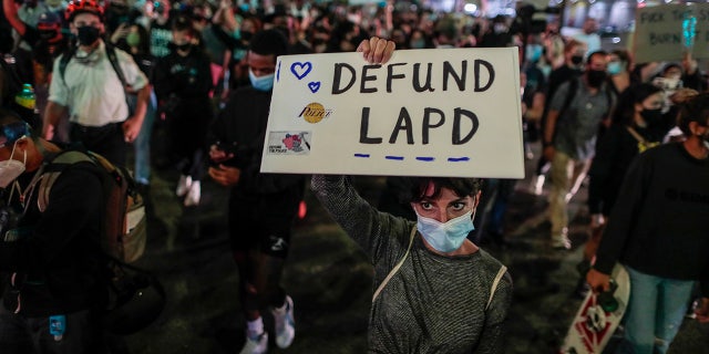 Los Angeles, CA, Thursday, September 24, 2020 - People protest the Kentucky grand jury decision in the case of Breonna Taylors death by Louisville police. (Robert Gauthier/ Los Angeles Times via Getty Images)