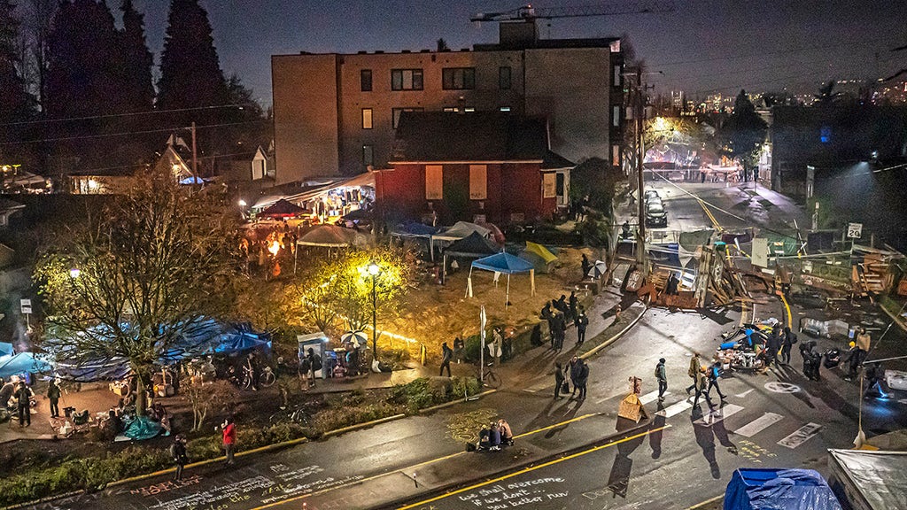 'Autonomous zone' holdouts fortify position in escalating Portland faceoff