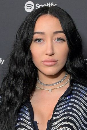 Artist 'so so sorry' after using 'racist' term