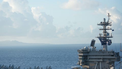 Aircraft carrier Theodore Roosevelt conducts 'man overboard' search for missing sailor