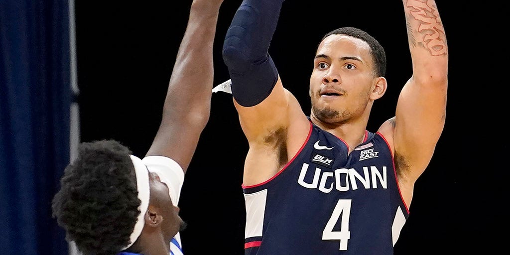 Unexpected win has UConn fans downing hot sauce for
charity