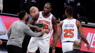 WATCH: Knicks player restrained by teammates, taken off the court after controversial call in loss to Nets