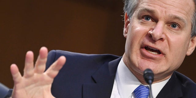 FBI Director Christopher Wray testifies before the Senate Judiciary Committee on Capitol Hill in Washington, Tuesday, March 2, 2021. (Mandel Ngan/Pool via AP)