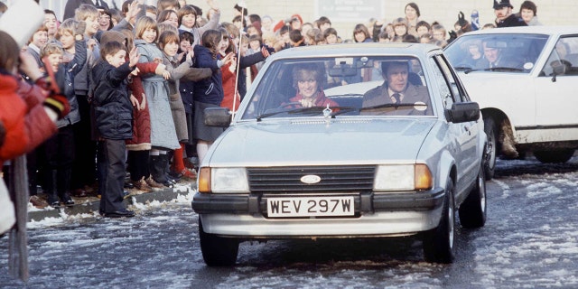 Diana Driving her car to a school visit with police bodyguard Graham Smith.