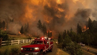 Rapid growing wildfire in south of Lake Tahoe jumps into a highway, prompting more evacuation orders