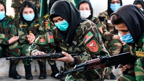 Afghan women carry guns in streets, protest Taliban as country struggles