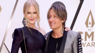 Actress hits CMA Awards red carpet in ab-baring svelte gown with Keith Urban