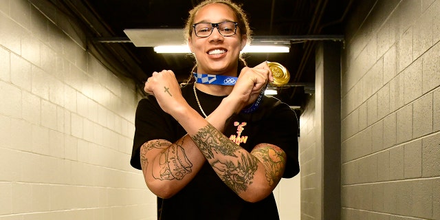 Brittney Griner of the Phoenix Mercury arrived with her gold medal from the 2020 Tokyo Olympics before competing with the Atlanta Dream on August 15, 2021 at the Footprint Center in Phoenix, Arizona.