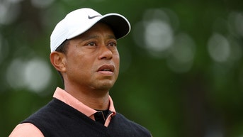 Ex-magazine bigwig says under oath he blackmailed Tiger Woods