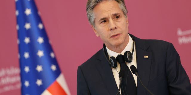 Secretary of State Antony Blinken, pictured, holds a press conference with Qatar's Foreign Minister in the capital Doha, on Nov. 22, 2022.