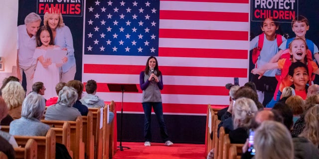 Republican gubernatorial candidate Tudor Dixon campaigns at a rally on Oct. 27, 2022, in St Clair, Michigan.