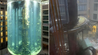 Massive 46-foot aquarium bursts, injuring 2 and flooding hotel lobby
