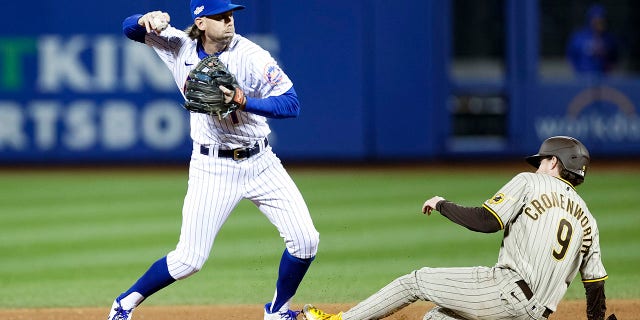 Mets' Jeff McNeil nudging teammate to make due on expensive promise after winning batting title read full article at worldnews365.me 6 Jeff McNeil #1 of the New York Mets tags out Jake Cronenworth #9 of the San Diego Padres and throws to first during the fourth inning in game two of the Wild Card Series at Citi Field on October 08, 2022, in New York City.