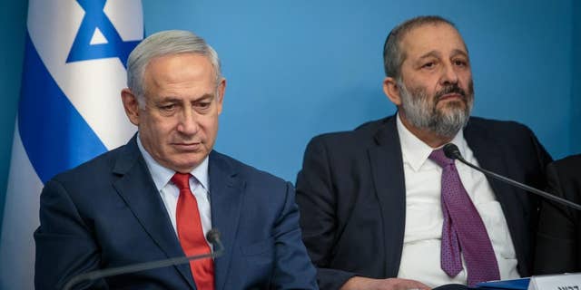 Netanyahu government suffers legal defeat as Israeli court bars minister from serving read full article at worldnews365.me 5 Benjamin Netanyahu, left, and Aryeh Deri
