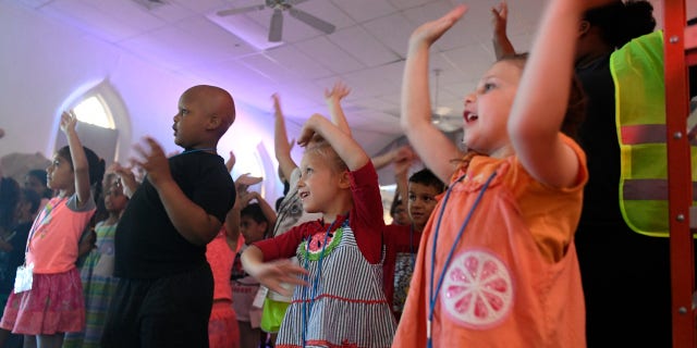 'Anti-religious bigotry': Nebraska Dem's bill would ban kids from vacation Bible schools, church youth groups read full article at worldnews365.me 5 Youth participants dance and sing during the Lighthouse Christian Center vacation Bible school in West Reading, Pennsylvania, on July 12, 2018.