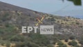 This image grab taken from an ERT video shows a Canadair firefighting aircraft as it goes down and crashes while being flown to fight a wildfire in Karystos, on the Greek Aegean island of Evia, on Juily 25, 2023. Two pilots died when their water-bombing plane crashed while battling a blaze on the Greek island of Evia on July 25, as wildfires flared across the Mediterranean. Greece&apos;s fire department said the Canadair aircraft crashed into a ravine close to where the fire started on Sunday. Footage on state TV ERT showed the plane clipping a tree before falling nose-first and exploding. (Photo by ERT / AFP) / ----IMAGE RESTRICTED TO EDITORIAL USE - STRICTLY NO COMMERCIAL USE----- (Photo by -/ERT/AFP via Getty Images)