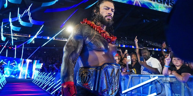 Roman Reigns walks to the ring