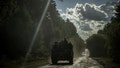 Ukrainian servicemen ride a military vehicle, amid Russias attack on Ukraine, near the Russian border in Sumy region, Ukraine August 11, 2024. - Fox News