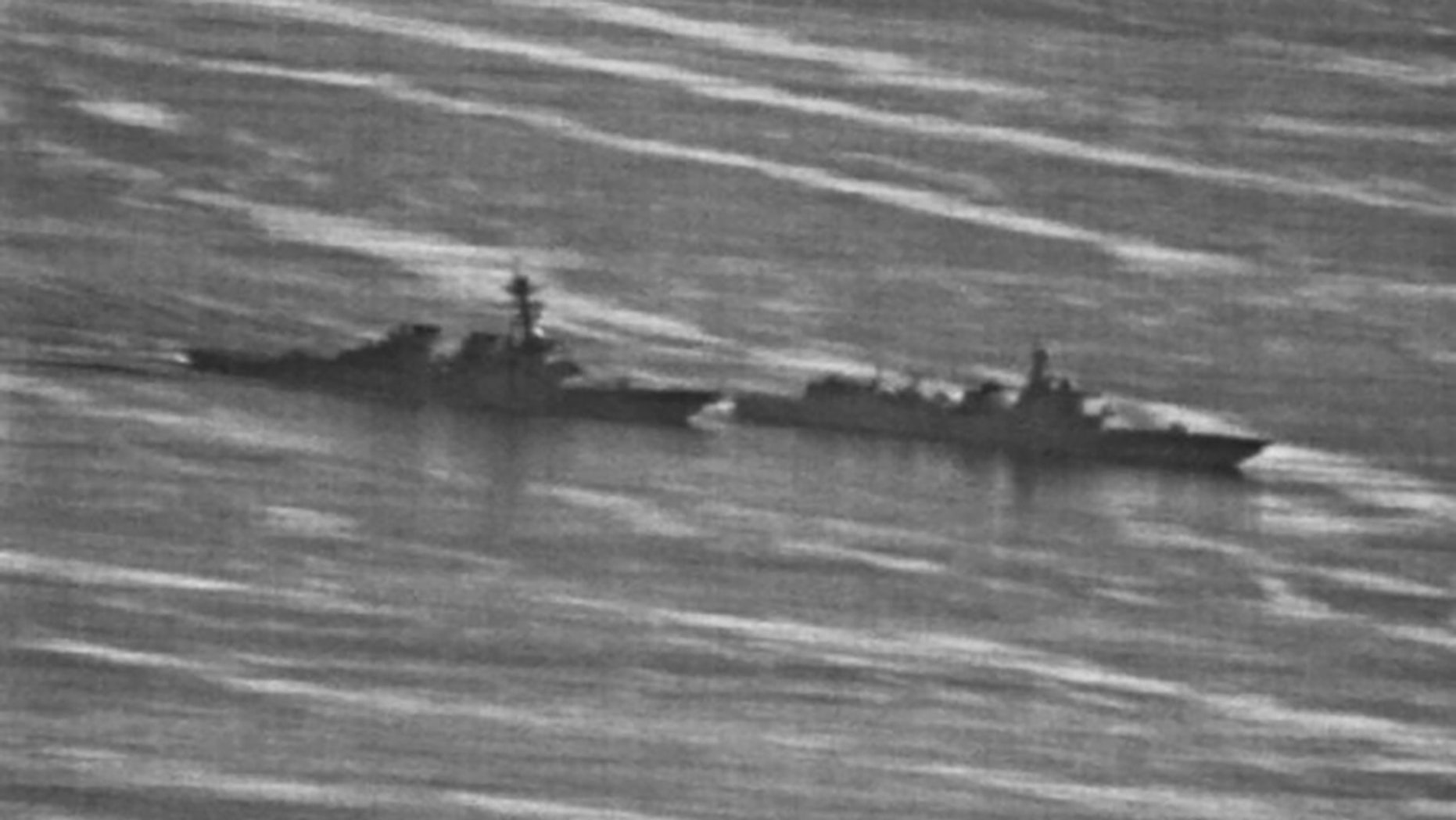 This U.S. Navy photo, first obtained by gcaptain.com, shows the incident between the USS Decatur, left, and the Luoyang.