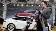 Elon Musk challenging Detroit to make electric cars