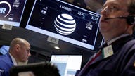 Dow kicks out AT&T and puts Apple in