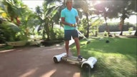 Skate board across the golf course to tee off