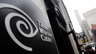 Time Warner, Charter Communications higher on merger reports