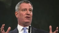 Does Mayor De Blasio want to take down Uber in NYC?