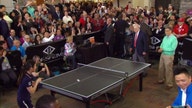 Laying the paddle down: Buffett, Gates play ping pong