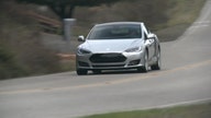 Tesla 4Q earnings top estimates