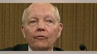 Smug and defiant IRS commissioner?