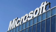Microsoft shares hit multi-year high