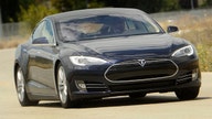 Tesla 2Q earnings top estimates