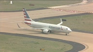 American Airlines adds fees for unaccompanied minors