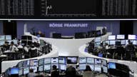 European shares mostly lower, German business confidence data weighs